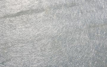 Shortacross laminate fibreglass or shingles?