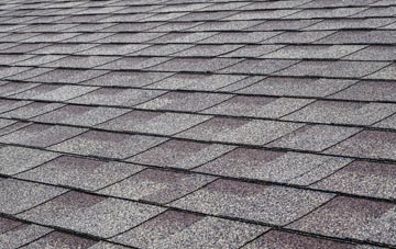 Shortacross tiles for shallow pitch roofing
